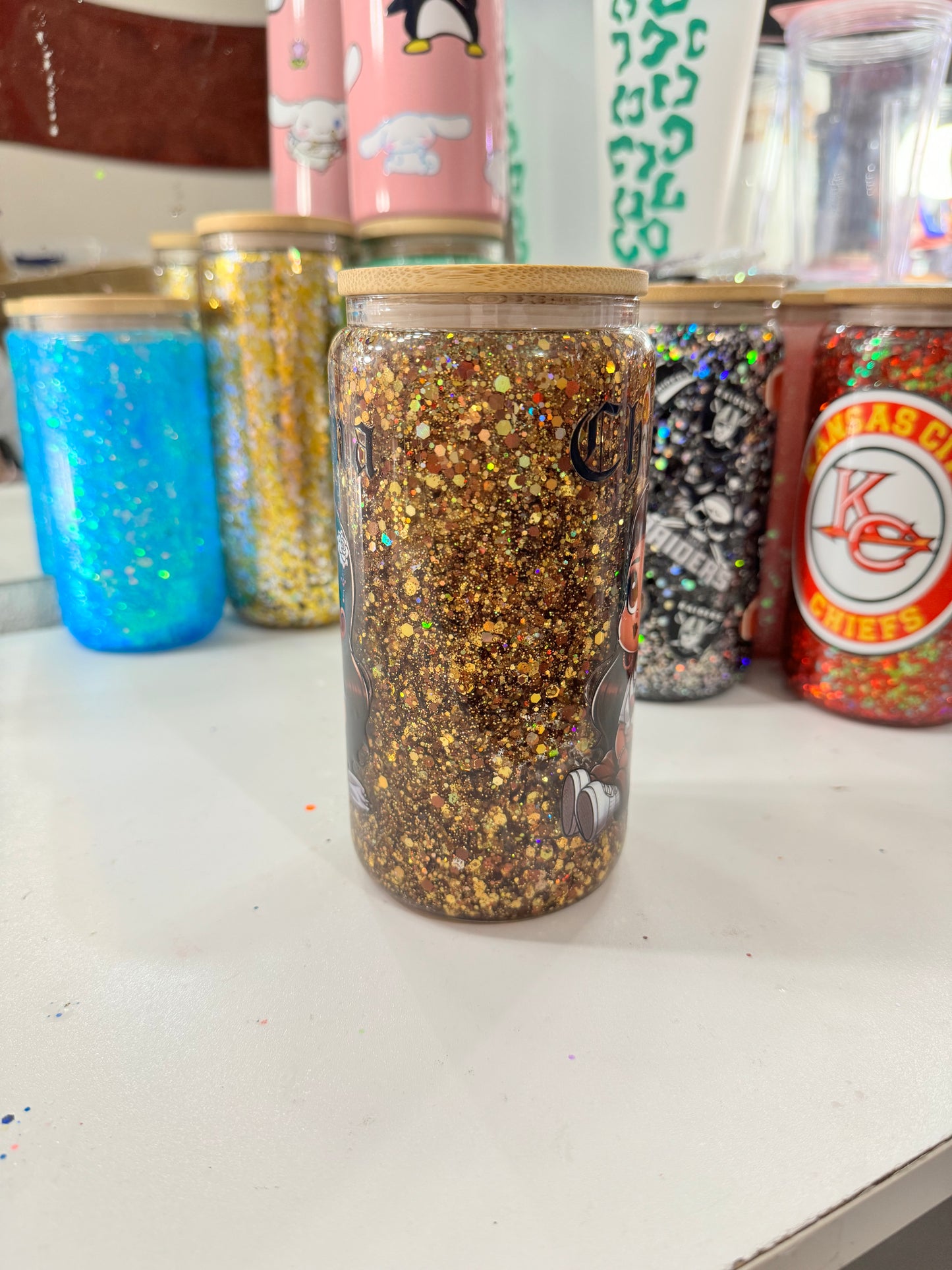 baby chicana snowglobe