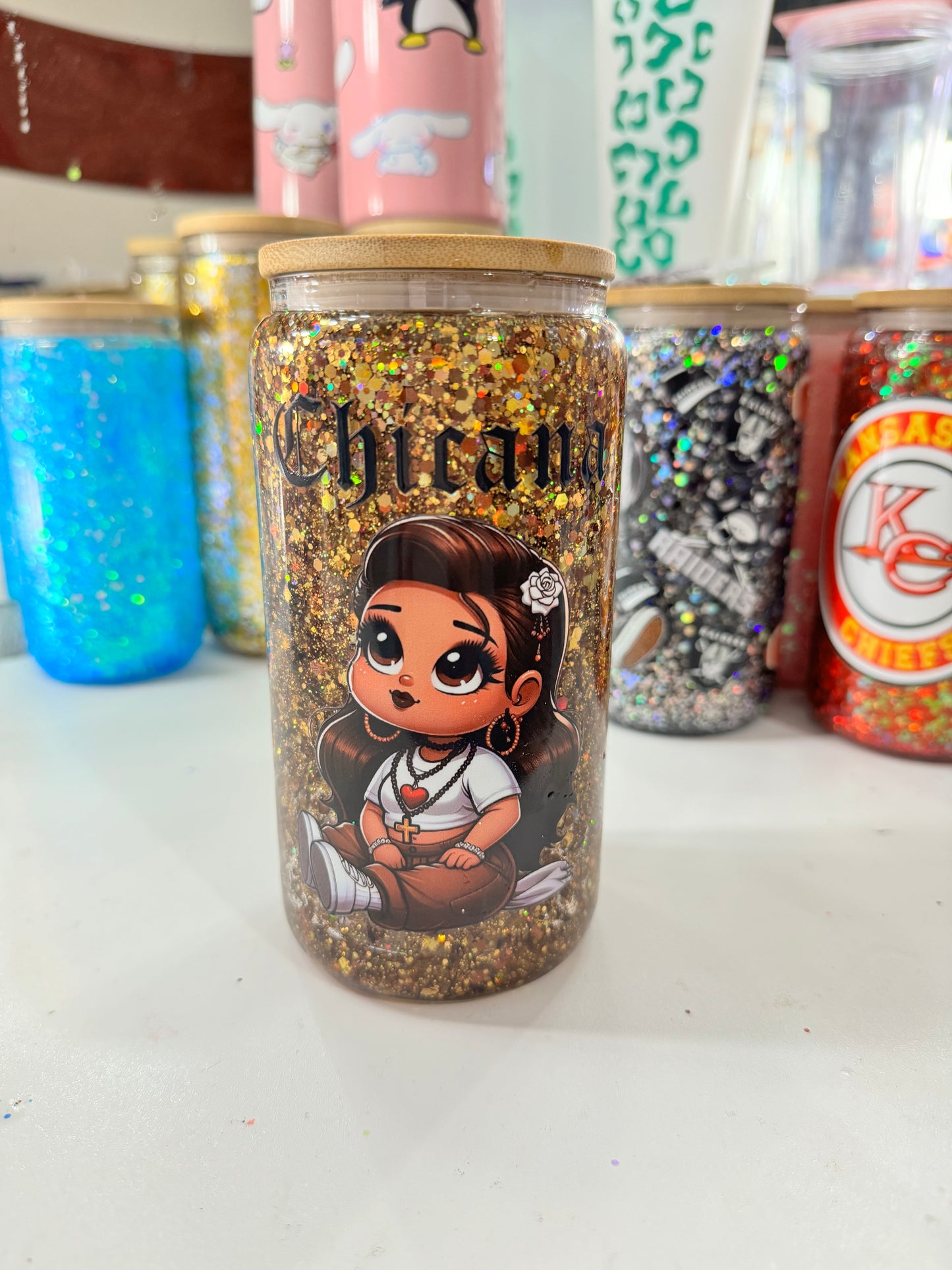 baby chicana snowglobe